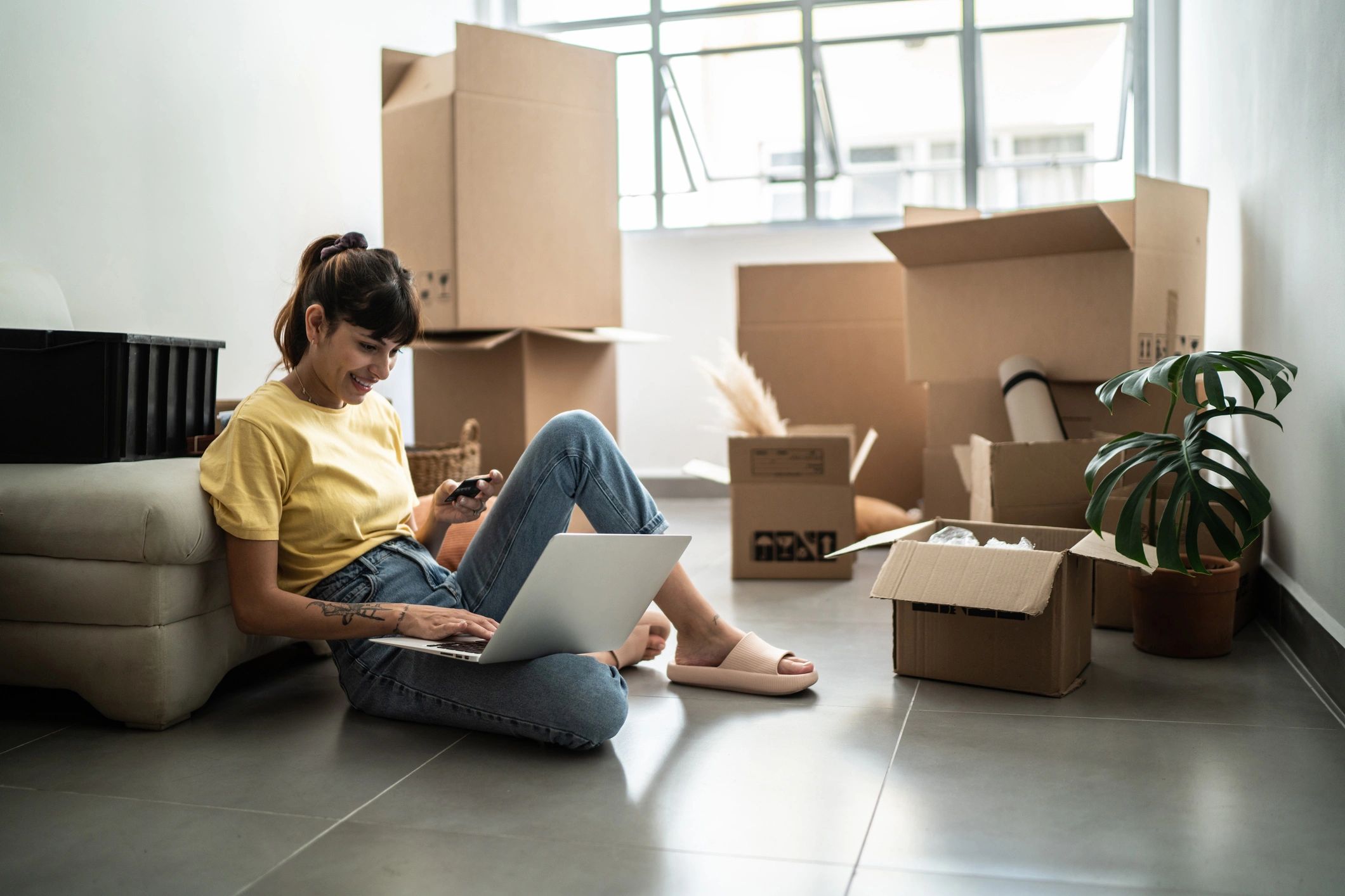 Person setting up new home and routines